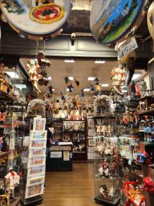 a store filled with lots of stuffed animals and toys at Suite SAN GENNARO BIS in Naples