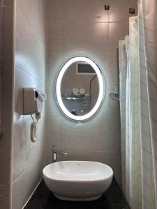 Vannituba majutusasutuses Le Shiv Executive Suite