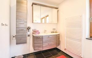 Bilik mandi di Gemuetliche Ferienwohnung