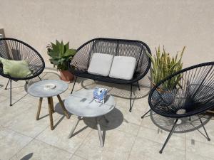 Un lugar para sentarse en Hammock Vibes Town House