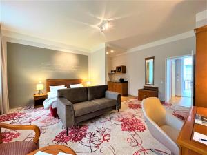 Ein Bett oder Betten in einem Zimmer der Unterkunft Batschari Palais Baden-Baden