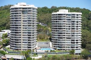 a large building with a lot of tall buildings at Gemini Court Holiday Apartments in Gold Coast