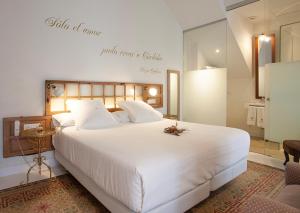 Postel nebo postele na pokoji v ubytování Hotel Madinat
