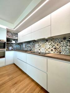 A kitchen or kitchenette at Due Lune Home