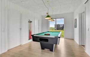 a billiard room with a pool table in it at Stunning Home In Lgstrup With Wifi in Løgstrup