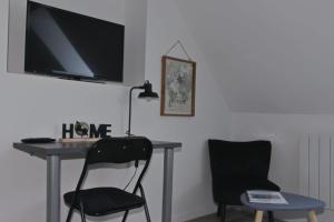 TV a/nebo společenská místnost v ubytování Location Tame
