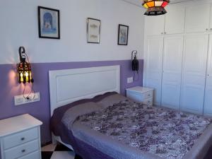 Maison d'Hôte à Saïdia客房内的一张或多张床位