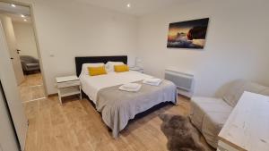 Кровать или кровати в номере Appartement indépendant dans maison près d'Annecy