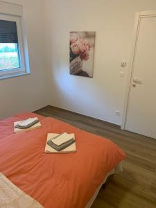 Posteľ alebo postele v izbe v ubytovaní Apartman Nataša