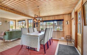 a dining room with a table and chairs at Awesome Home In Nyborg With Wifi in Nyborg