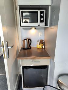Kuchyň nebo kuchyňský kout v ubytování Apartamenty Duo