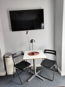TV a/nebo společenská místnost v ubytování Apartamenty Duo