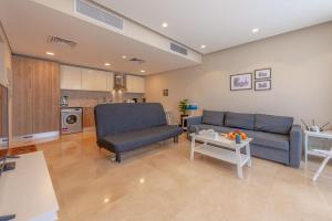A kitchen or kitchenette at VESTA - El Gouna Residence