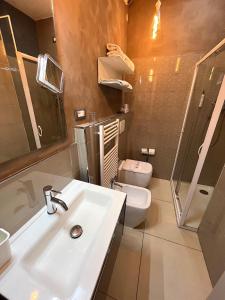 Łazienka w obiekcie Hotel Regina