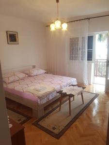 Posteľ alebo postele v izbe v ubytovaní Apartman Zaric