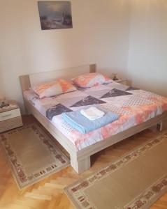 Posteľ alebo postele v izbe v ubytovaní Apartman Zaric