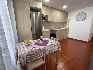 Kuchyň nebo kuchyňský kout v ubytování Apartamento SLAM