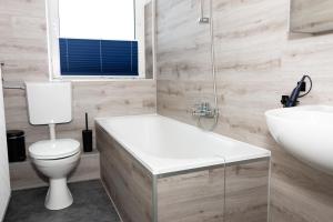 Bilik mandi di Ferienwohnung Tide +12 gambar