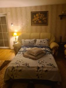 Un pat sau paturi într-o cameră la Vila Mara