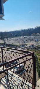 a view of a park with benches and a field at RIA Room - Apartemente 9 in Baile Felix