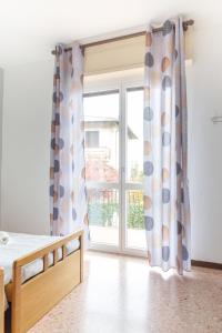 A bed or beds in a room at La Ginestra - between lake and mountains