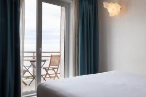 Кровать или кровати в номере Petit Palace Tamarises