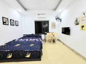 Ένα ή περισσότερα κρεβάτια σε δωμάτιο στο Ruby Relax Home