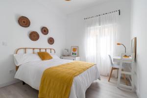 Postel nebo postele na pokoji v ubytování Apartamento La Atalaya