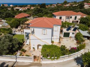 an aerial view of a house with a red roof at Villa Erasmia- House 2 upper floor in Sarláta