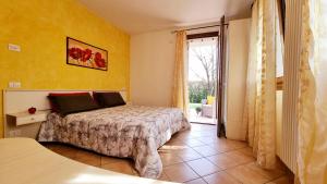 A bed or beds in a room at Villa Venezia