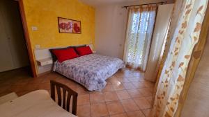 A bed or beds in a room at Villa Venezia
