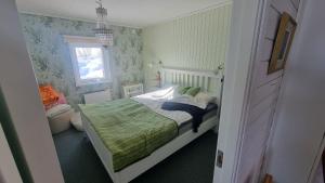 Säng eller sängar i ett rum på Klimpfjälls hus & lägenhet