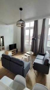 Posedenie v ubytovaní Bel Appart' 3 chambres 3 Sdb au centre-ville St Etienne