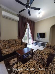 Posezení v ubytování Jom Singgah Homestay - Perlis