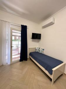 A bed or beds in a room at Casa Onofrio Tropea