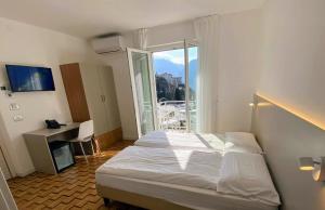 Rúm í herbergi á Albergo Garni Francesco