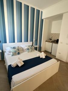 A bed or beds in a room at Casa Onofrio Tropea