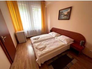 Posteľ alebo postele v izbe v ubytovaní Penzion Zornicka