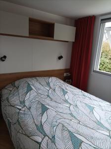 Ένα ή περισσότερα κρεβάτια σε δωμάτιο στο Superbe Mobil Home