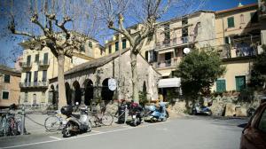 a group of motorcycles parked on the side of a street at affittacamere la loggia in Levanto