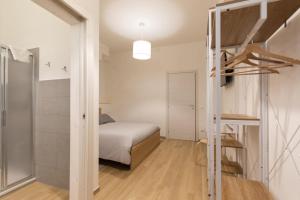 Postel nebo postele na pokoji v ubytování B&B La Camia