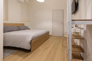 Postel nebo postele na pokoji v ubytování B&B La Camia
