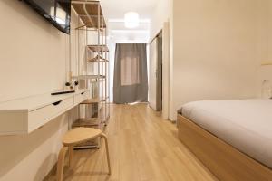 Postel nebo postele na pokoji v ubytování B&B La Camia