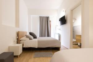 Postel nebo postele na pokoji v ubytování B&B La Camia