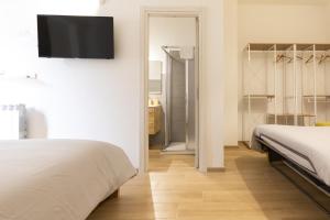 Postel nebo postele na pokoji v ubytování B&B La Camia