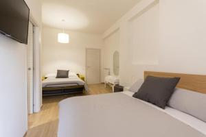 Postel nebo postele na pokoji v ubytování B&B La Camia