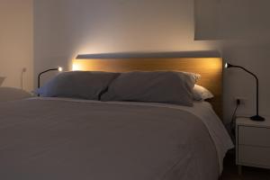 Postel nebo postele na pokoji v ubytování B&B La Camia