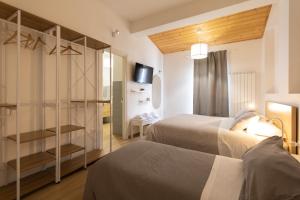 Postel nebo postele na pokoji v ubytování B&B La Camia