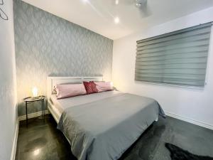 Postel nebo postele na pokoji v ubytování Visaya Pearl + 37 fotografií
