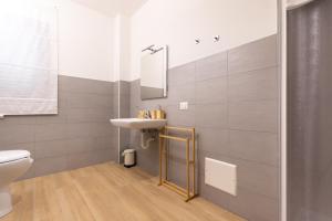 a bathroom with a sink and a toilet at B&B La Camia in Castel di Sangro